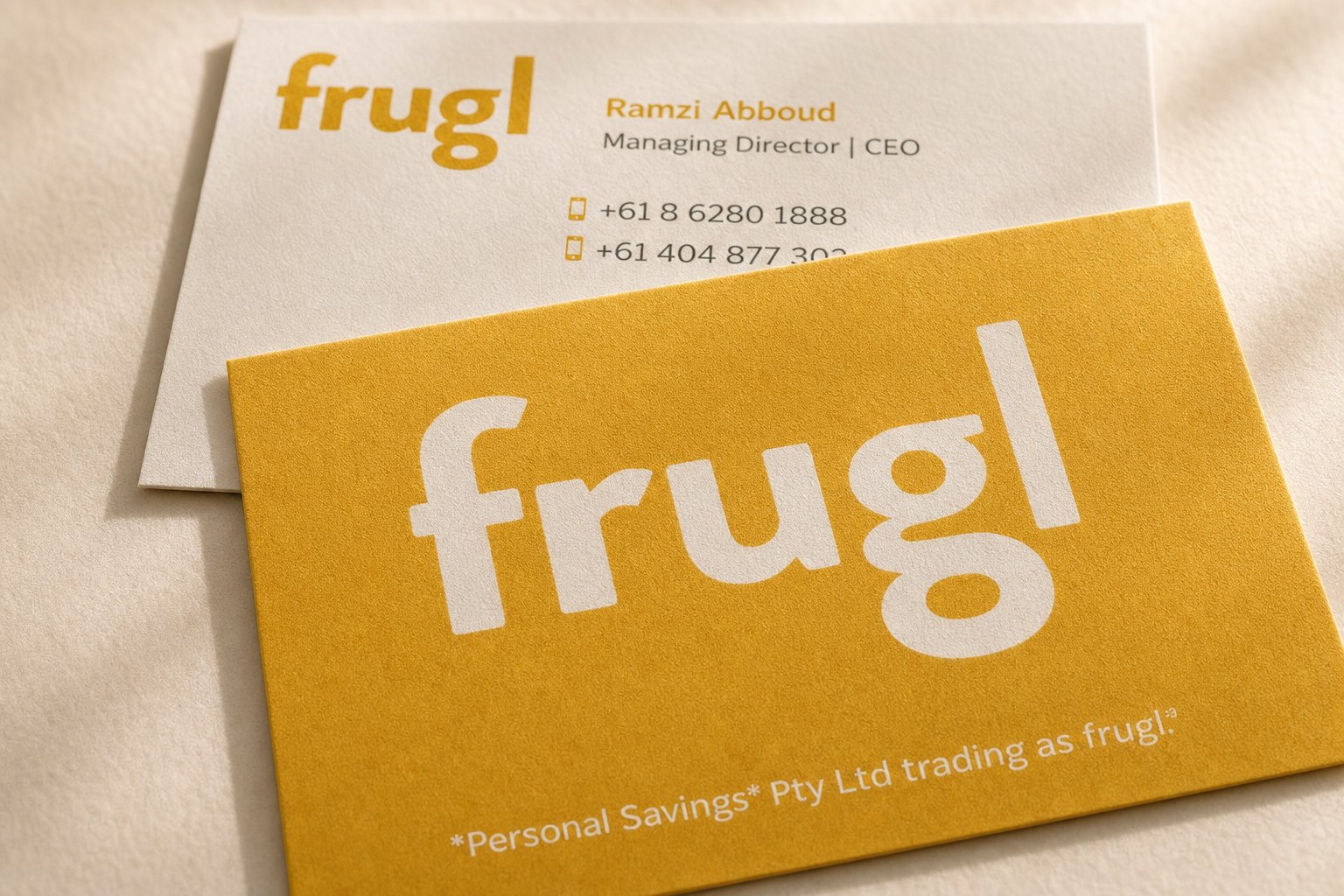 Yellow velvet-laminated business card showing suede texture