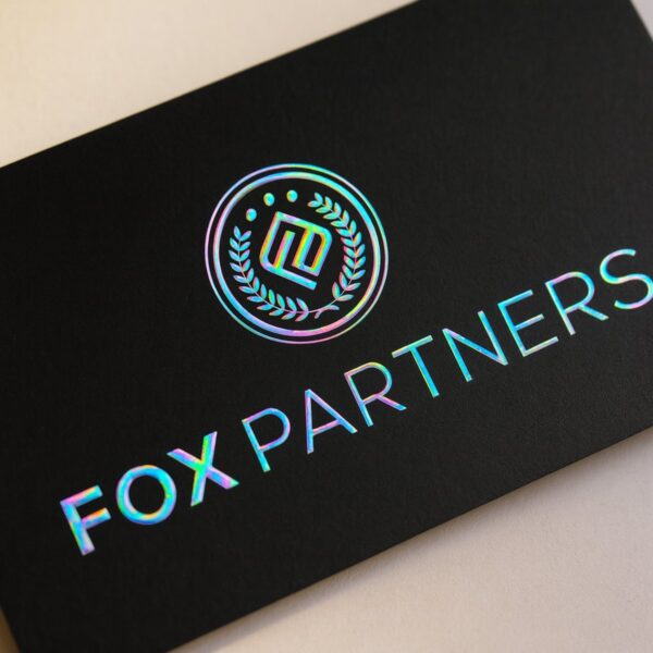 Holographic foil close-up on black business card