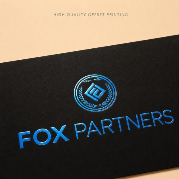 Macro close up of electric blue foil typography on a black business card