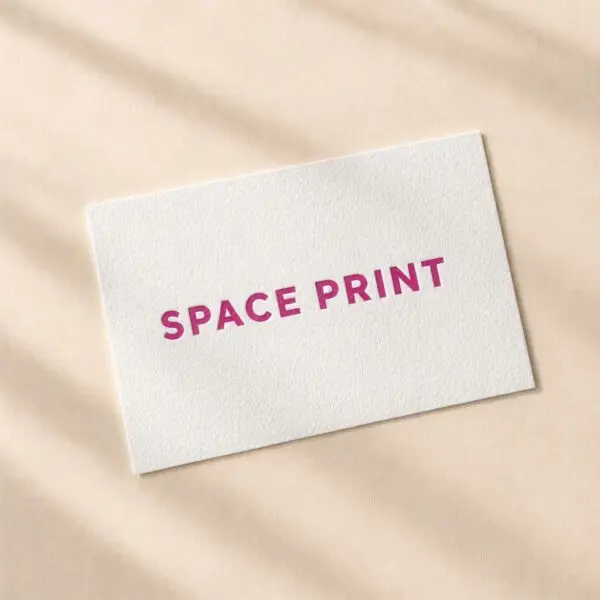 Natural white cotton business card with flat magenta print
